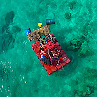 The contestants from 'The Mole' Season 2 on a raft.