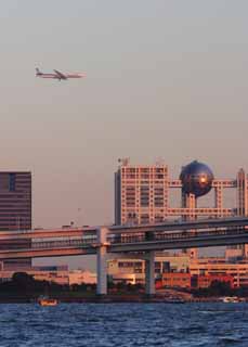 photo,material,free,landscape,picture,stock photo,Creative Commons,Airplane over the bay, building, sea, airplane, evening twilight