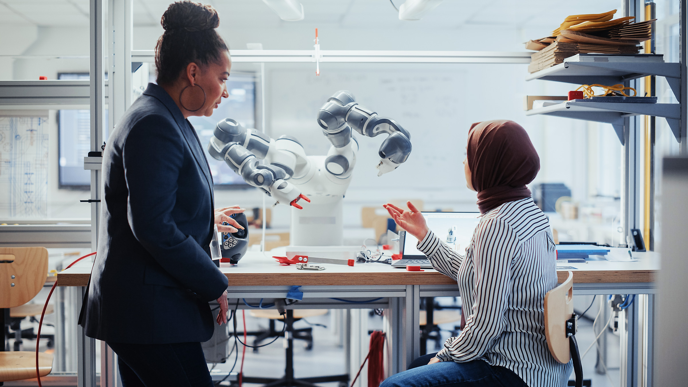 instructor and student in a research lab