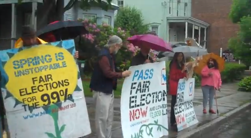 Members rally outside Senator Farley's office