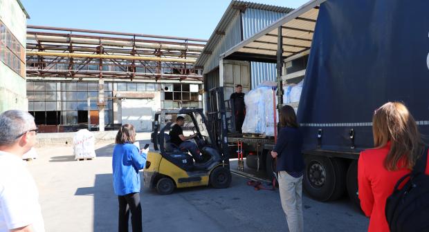 OSCE contractor GEOCOMA employees loading the truck transporting the dangerous chemicals from Transdniestria for incineration in Germany, 2024.  (OSCE/Ecaterina Leuca)