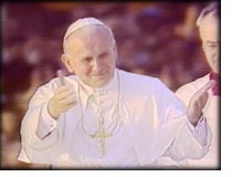 pope with arms outstretched