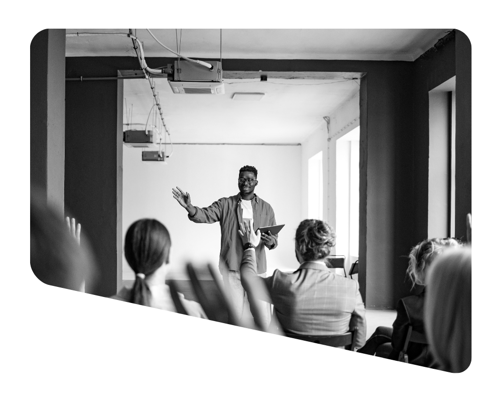 Black male teacher standing in front of lecture