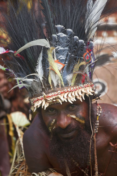 Picture of Madang festival (Papua New Guinea): Man from the Boroi singsing group posing for a picture