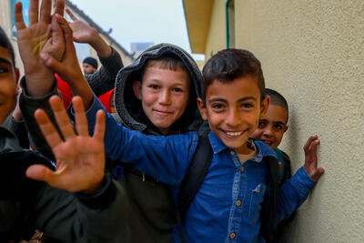 Syrian children smiling at the camera