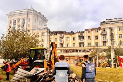 UN staff inspect damaged residential areas in Dnipro, Ukraine, after an attack left civilians, including children, injured and civilian infrastructure compromised