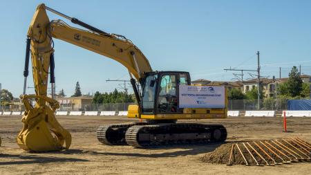 excavator at Groundbreaking event