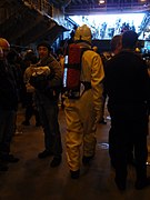 British sailors in firefighting gear on HMS Illustrious (R06), Liverpool, 25 October 2009