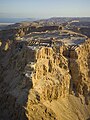Image 15 Masada Photograph: Andrew Shiva An aerial view of Masada, an ancient fortification in the Southern District of Israel. Found atop an isolated rock plateau, it overlooks the Dead Sea. The first fortifications on the mountain were built by Alexander Jannaeus, and significantly strengthened by the Roman client king Herod between 37 and 31 BCE. During the First Jewish–Roman War of 66–73 CE, the fortress was besieged, falling only after the 960 Sicarii defending it committed mass suicide. Masada is among the more popular tourist attractions in Israel, and in 2001 it was made a UNESCO World Heritage Site. More featured pictures