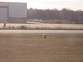 Detail view of crash location at northwest corner of US Airways hangar at Charlotte Douglas International Airport viewed from Runway 5.