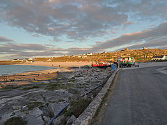 View walking from pier towards beach / O'Brien's Castle