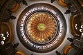 Image 52The dome of the Illinois State Capitol. Designed by architects Cochrane and Garnsey, the dome's interior features a plaster frieze painted to resemble bronze and illustrating scenes from Illinois history. Stained glass windows, including a stained glass replica of the State Seal, appear in the oculus. Ground was first broken for the new capitol on March 11, 1869, and it was completed twenty years later. Photo credit: Daniel Schwen (from Portal:Illinois/Selected picture)