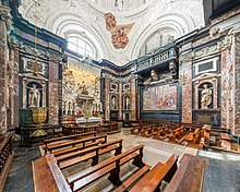 An ornate chapel, seen from the side