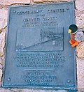 A close-up of the plaque on the historical marker