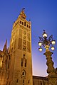 Image 20 Giralda Photo: David Iliff The Giralda is a 104.5 m (343 ft) tall bell tower for the Seville Cathedral in Seville, Andalusia, Spain. It was originally constructed as a minaret in 1198, when Seville was ruled by the Almohad Caliphate. After the city was taken by the Christians in the Reconquista, the city's mosque was converted to a church. The upper third of the structure was completed during the Spanish Renaissance. More selected pictures