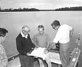 Image 18Roy O. Disney inspecting design plans on-site in Florida (from Walt Disney World)