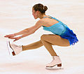 A basic sit spin in figure skating by Kimmie Meissner.