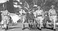 Image 17Lieutenant-General Arthur Percival, led by a Japanese officer, marches under a flag of truce to negotiate the capitulation of Allied forces in Singapore, on 15 February 1942. It was the largest surrender of British-led forces in history. (from History of Singapore)