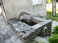 Fontaine à l'entrée du hameau de Muna.