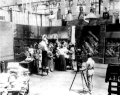 Image 33A.E. Smith filming The Bargain Fiend in the Vitagraph Studios in 1907. Arc floodlights hang overhead. (from History of film)