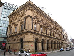 exterior of a Victorian building with ornate brickwork