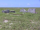 Settlement remains, radio mast in background
