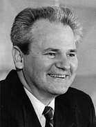 Slobodan Milošević smiling in the Assembly of the Socialist Republic of Serbia in 1988