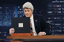 Late night host Jimmy Kimmel dressed up as Jay Leno