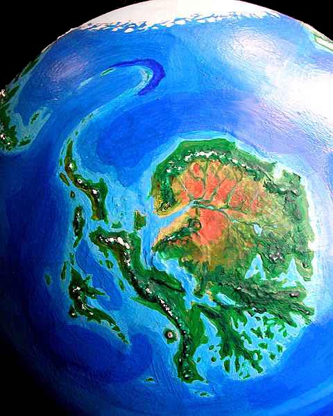 Orbital view of Seapole, a climatologically alternate Earth: Ornithia, the tropical landmass analogous to our Antarctica. Click to enlarge.