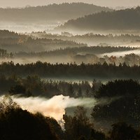 Morning mist over the Bobolice in Polish Jura