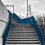 stairs with blue railings