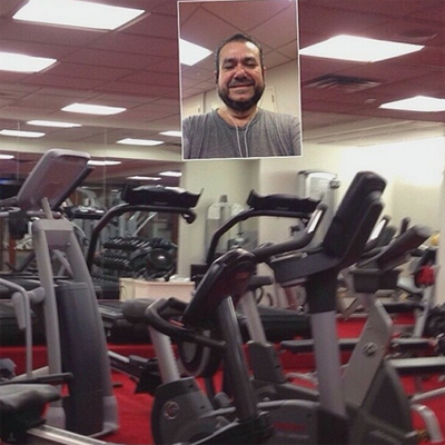 Guy takes selfie in a gym