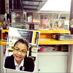 Funny young girl takes a selfie at her office