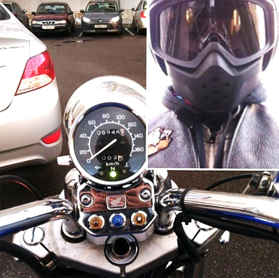 Selfie of a motorcyclist and his bike