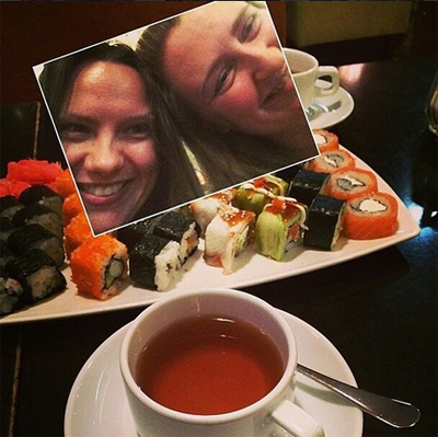 Two girls enjoy their sushi set