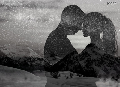 A double exposure effect used to create a black and white photo wherein an image with night sky and stars is merged with a romantic silhouette photo