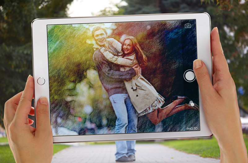 Make artistic photo manipulation that blends reality and drawing on an iPad screen