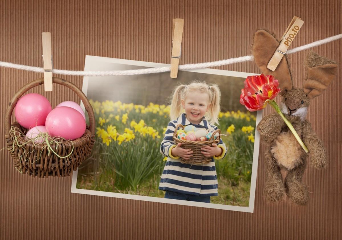 A photo of a girl who is standing with a basket of painted eggs in a frame