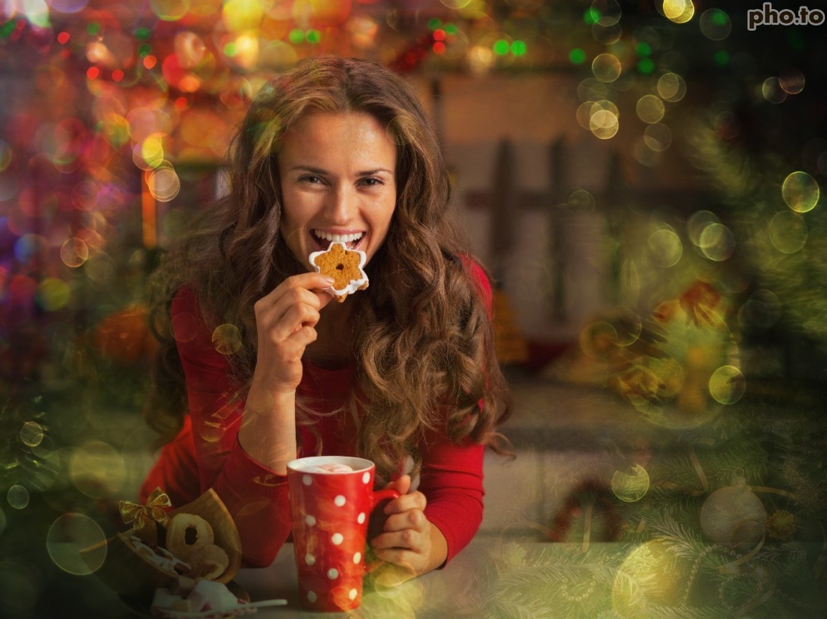 Photo young woman taken in Christmas and edited to add festive bokeh effect