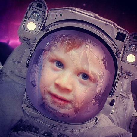 Photo of a kid wearing a space suit made with astronaut photo template