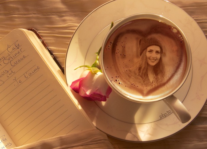 Fantastic photo effect: portrait in a cup of coffee