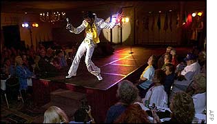 Dennis Stella of Calumet City, Illinois, performs during the Images of the King Tribute at the Holiday Inn Select Hotel 14 August 2002 in Memphis, Tennessee