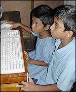 Children using computer in Brac school