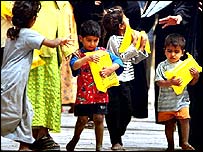 Local children happy to receive food rations in Nasiriya