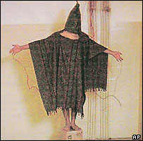 A hooded and wired Iraqi prisoner is seen at the Abu Ghraib prison near Baghdad, Iraq in this undated photo. (AP Photo/Courtesy of The New Yorker)