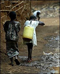 Girls carry water in Kenya