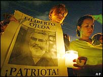 Protester carrying a poster of Filiberto Ojeda Rios at a demonstration in San Juan on Saturday