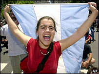 A demonstrator shouts anti-government slogans on 20 December in Buenos Aires