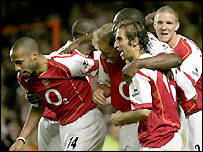 Arsenal celebrate a goal during their 7-0 win over Everton