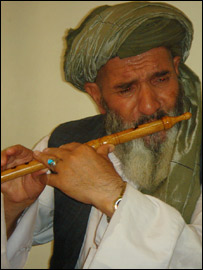 Afghan reed flute player